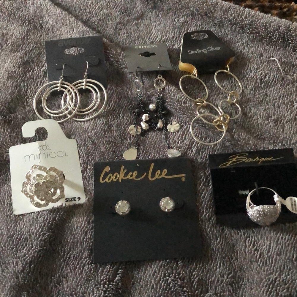 2 rings and 4 earrings.